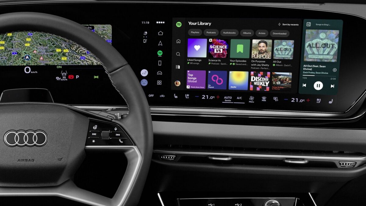 Natywna aplikacja Spotify w Audi widoczna na ekranie MMI podczas jazdy