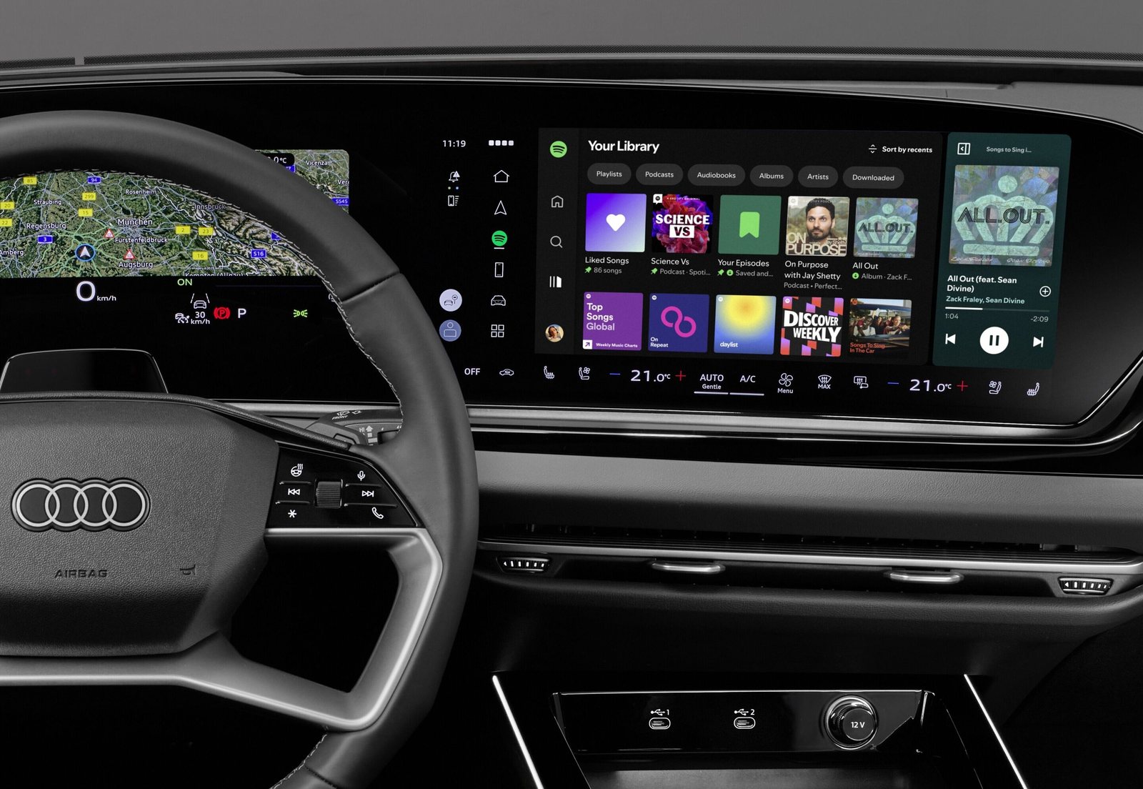 Natywna aplikacja Spotify w Audi widoczna na ekranie MMI podczas jazdy